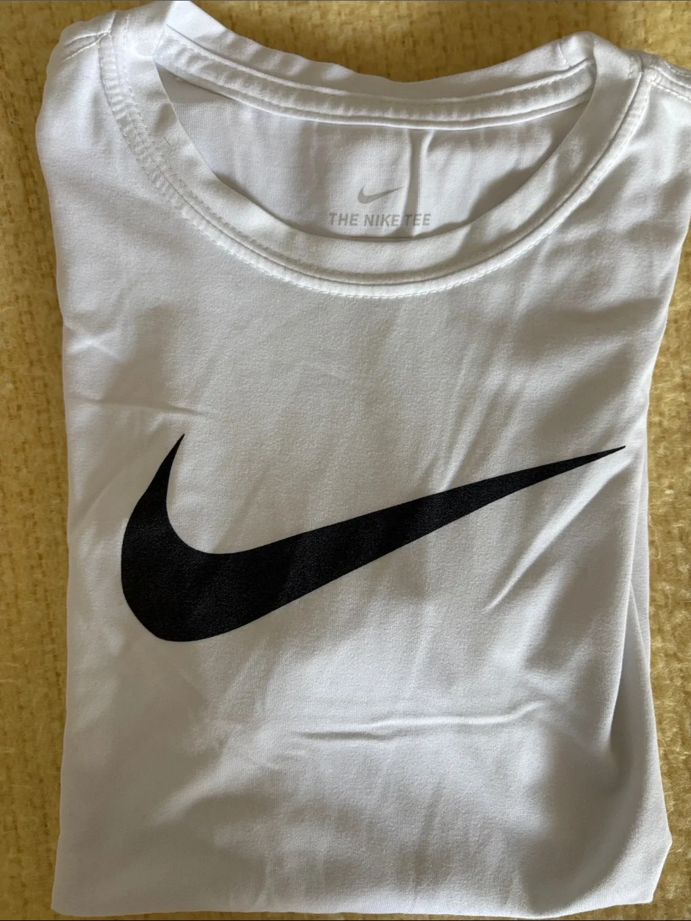 Nike White T-Shirt with Black Swoosh Logo